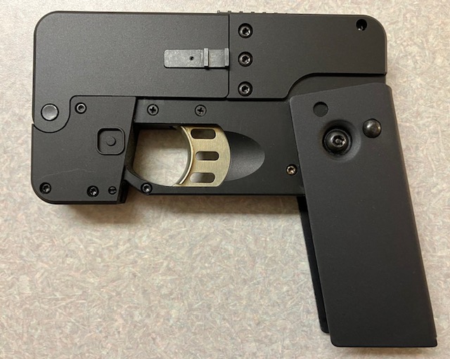 La "Ideal Conceal" non può sparare se non è del tutto estesa in questo modo - By Moops - Own work, CC BY-SA 4.0, https://commons.wikimedia.org/w/index.php?curid=128449542